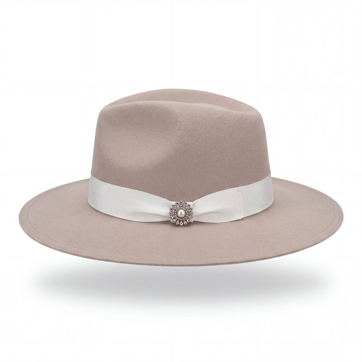 Spirit Warrior Provisions beige felt pinch front hat with a white ribbon hatband and circular sunflower concho.