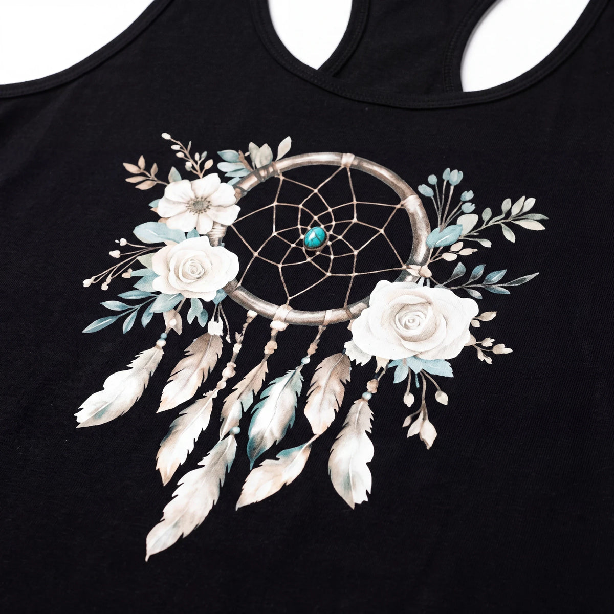 Spirit Warrior Provisions black cotton tank top featuring a boho dreamcatcher, white roses, and feather graphic print.