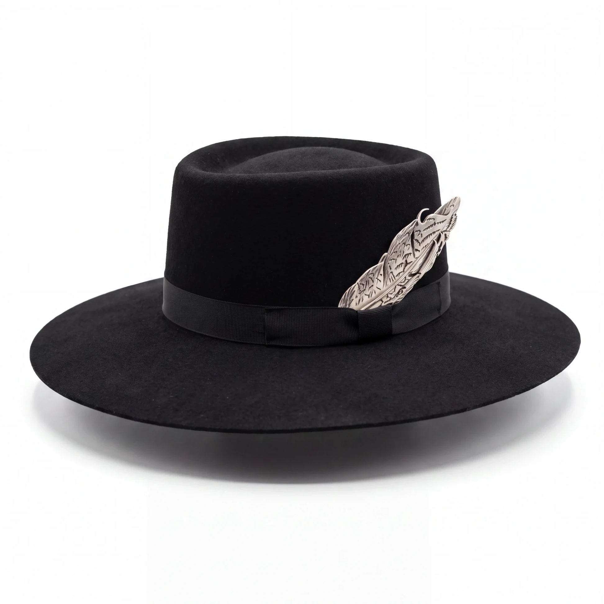 Spirit Warrior Provisions black felt gambler hat with a 4-inch brim, grosgrain ribbon, and silver pheasant tail detail.