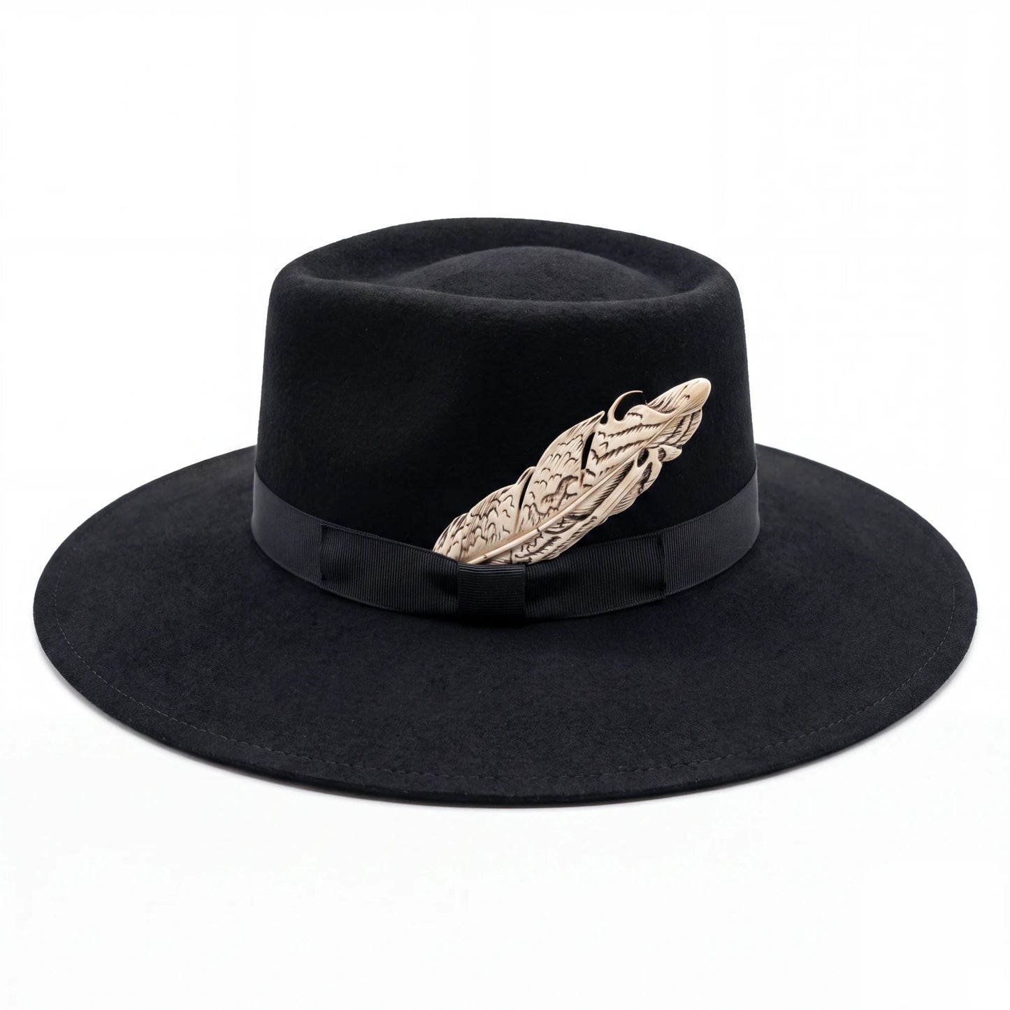Spirit Warrior Provisions black gambler felt hat with a 4-inch flat brim, grosgrain ribbon, and silver pheasant tail.