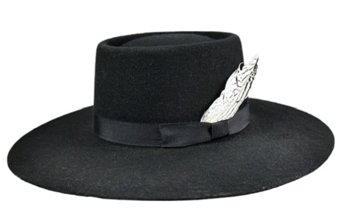 Spirit Warrior Provisions black gambler felt hat with a 4-inch flat brim, grosgrain ribbon, and silver pheasant tail.