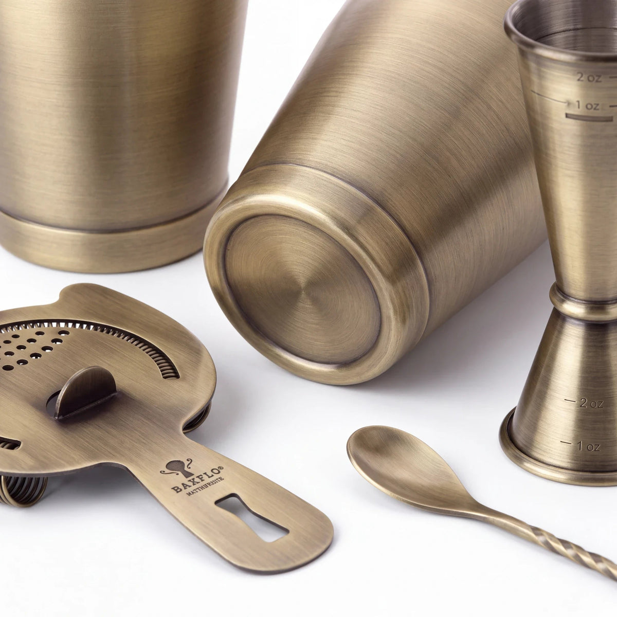 Spirit Warrior Provisions professional cocktail shaker set in brushed antique brass finish with jigger and strainer