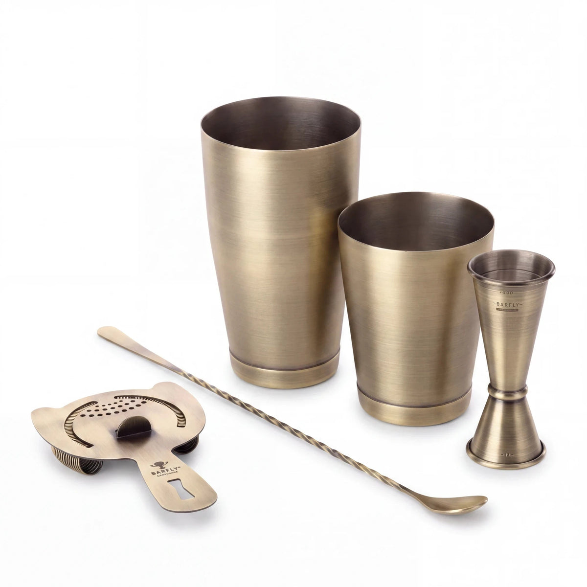 Spirit Warrior Provisions professional cocktail shaker set in antique brass finish with Boston shaker, jigger, and spoon