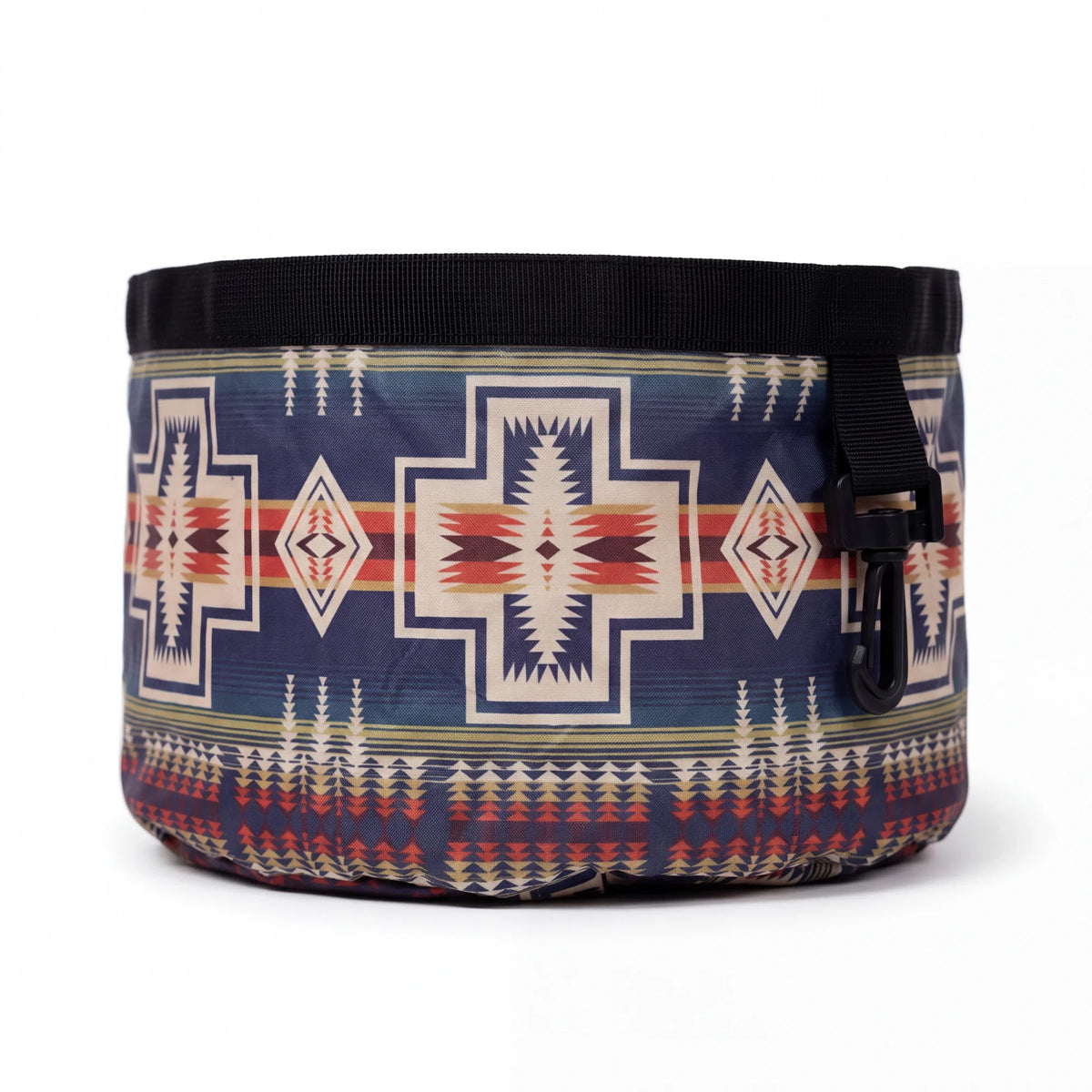 Spirit Warrior Provisions collapsible dog bowl in a blue Pendleton-style geometric pattern with a black clip.