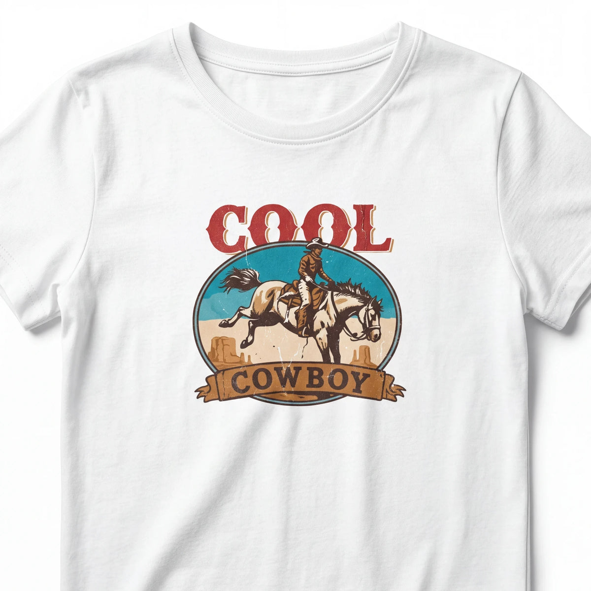 Spirit Warrior Provisions white cotton T-shirt featuring a vintage-style rustic cowboy riding a horse graphic print.