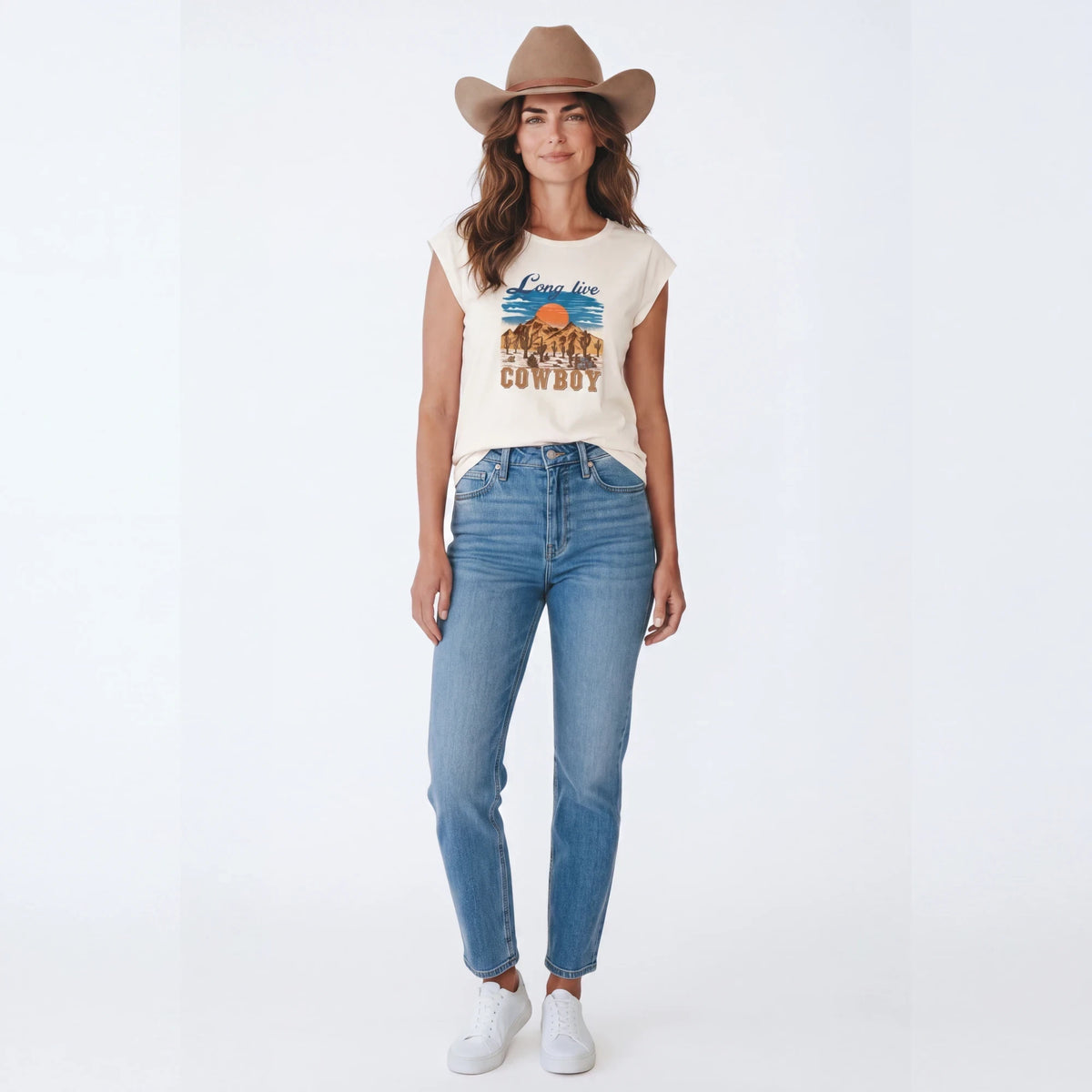 Spirit Warrior Provisions vintage-style cream cotton t-shirt with desert rodeo graphic worn by a woman in a cowboy hat