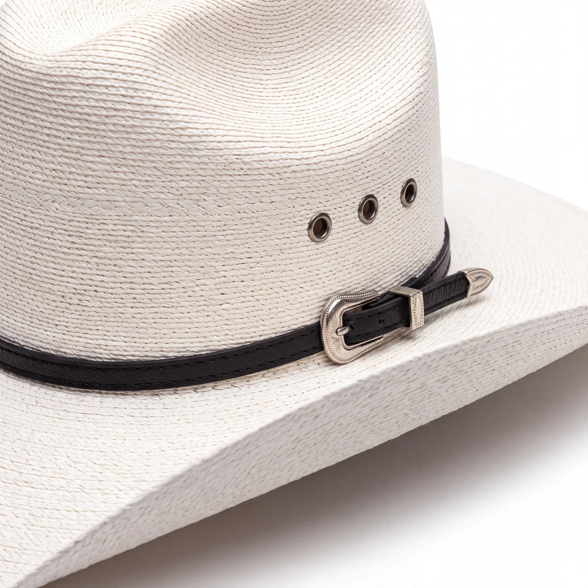 Spirit Warrior Provisions cream fine palm cowboy hat in cattleman style with a black leather band and silver concho.