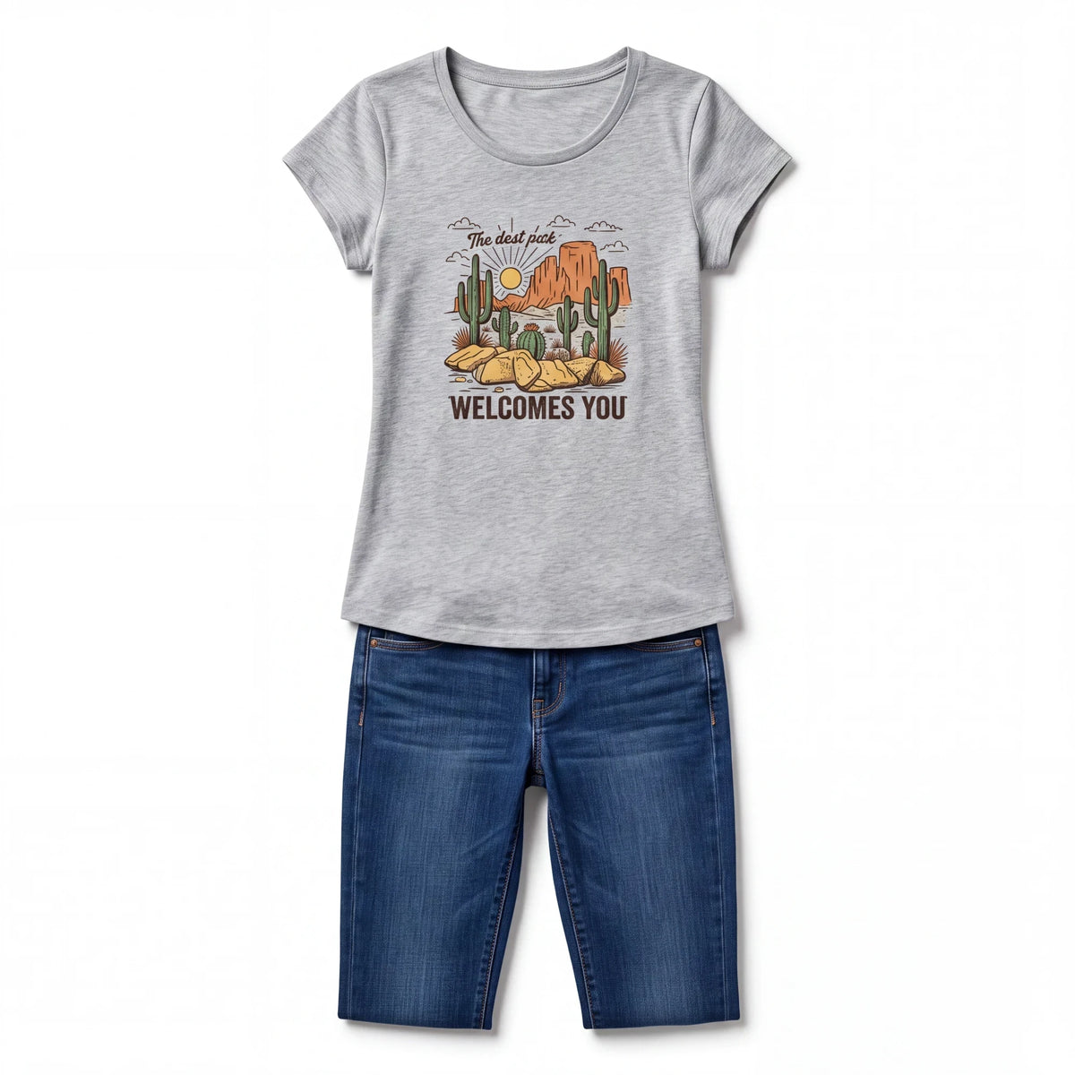 Spirit Warrior Provisions grey cotton graphic tee featuring a desert landscape print paired with blue denim shorts.