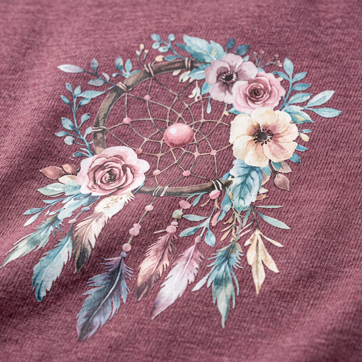 Spirit Warrior Provisions rustic maroon cotton t-shirt featuring a detailed floral dreamcatcher graphic print