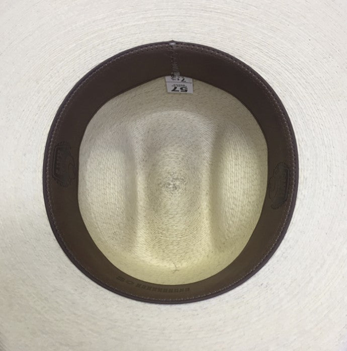 Spirit Warrior Provisions cream fine palm cowboy hat interior showing brown leather sweatband and size tag
