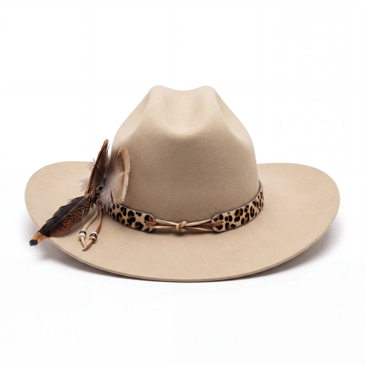 Spirit Warrior Provisions Ocelote sand 6X felt cattleman hat with cheetah print leather band and feather accents.