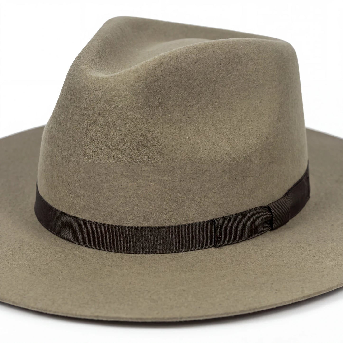 Spirit Warrior Provisions sand felt cowboy hat with a structured pinch-front crown and brown grosgrain ribbon hatband.