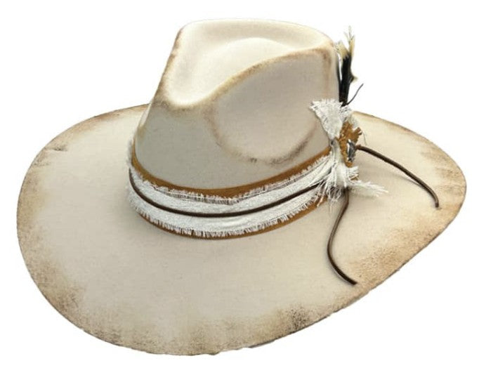Spirit Warrior Provisions Camino sand felt hat with a pinch front, camel leather band, white lace, and tooled concho.