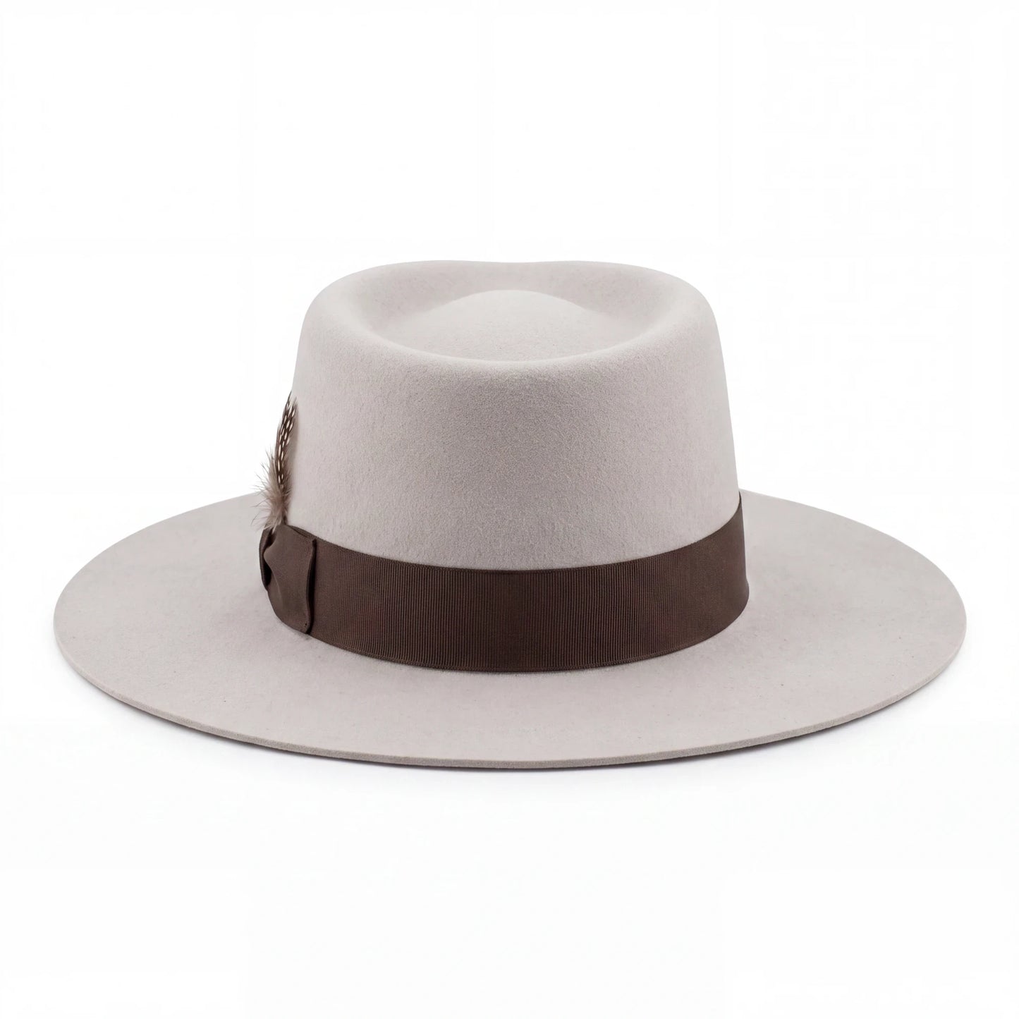 Spirit Warrior Provisions sand gambler hat with a flat brim, brown grosgrain ribbon, and a small feather detail reshaped version by hatter