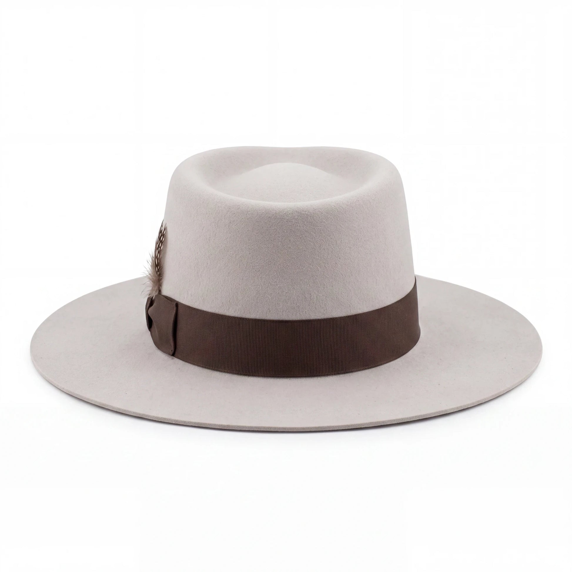 Spirit Warrior Provisions sand gambler hat with a flat brim, brown grosgrain ribbon, and a small feather detail reshaped version by hatter