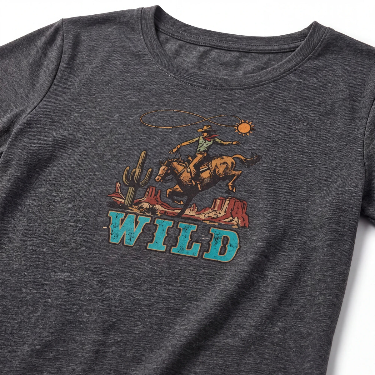 Spirit Warrior Provisions charcoal grey cotton t-shirt featuring a vintage Western rodeo graphic of a cowboy on a horse